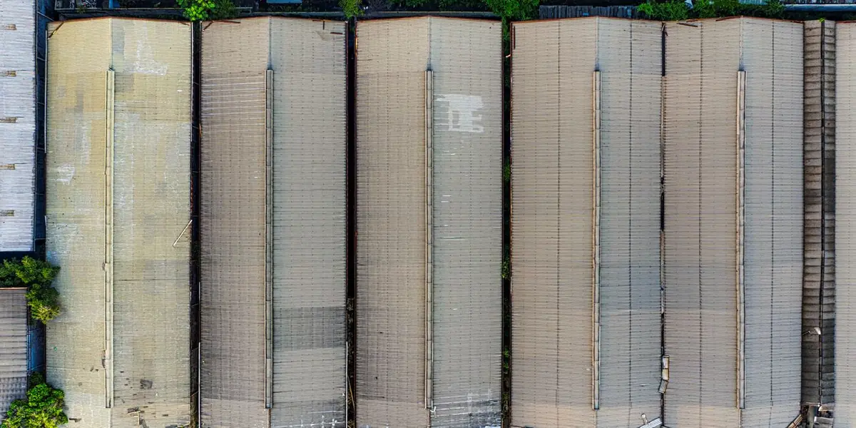 A row of corrugated rolling steel doors