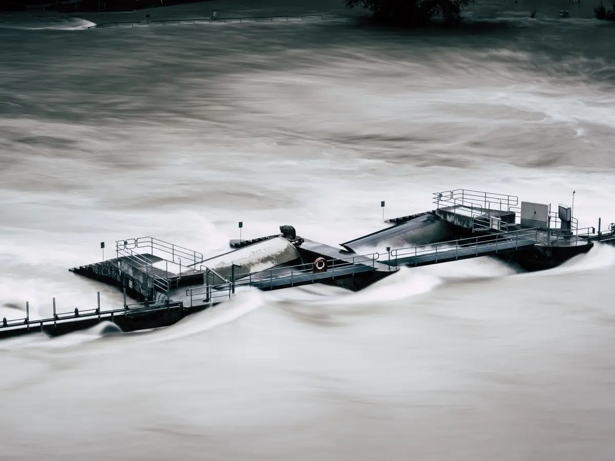 Flood water washing over a structure